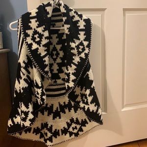 Sweater Vest. Black & White reversible pattern.